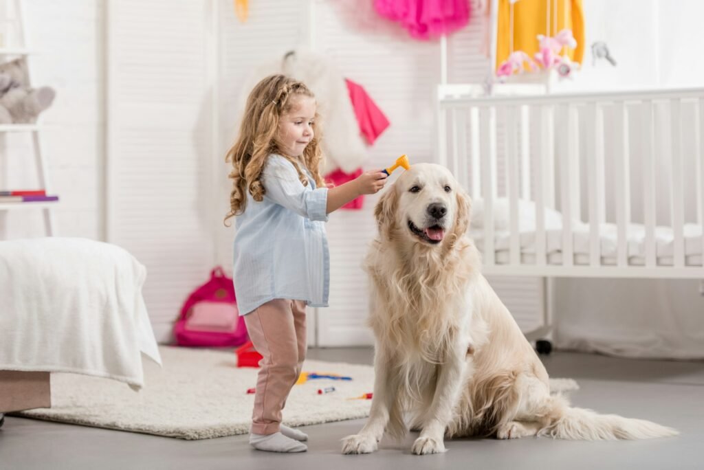 cheerful adorable kid pretending veterinarian and examining golden retriever in children room